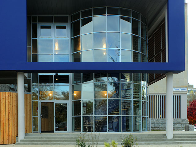 Building entrance with large glass wall