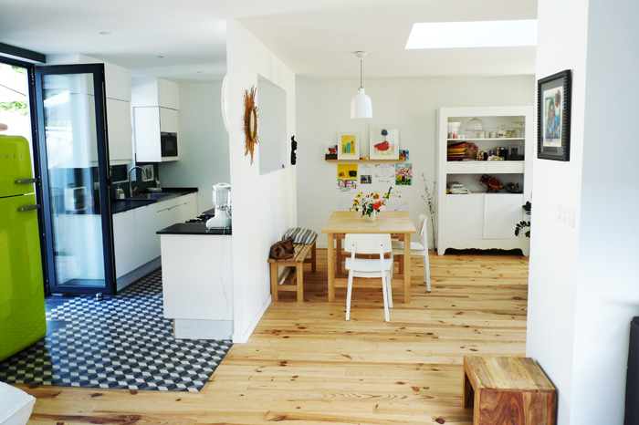 Kitchen opened on a dining room and outside