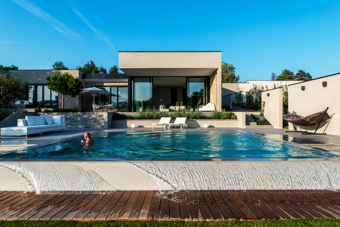 Infinity pool in the garden of a modern house