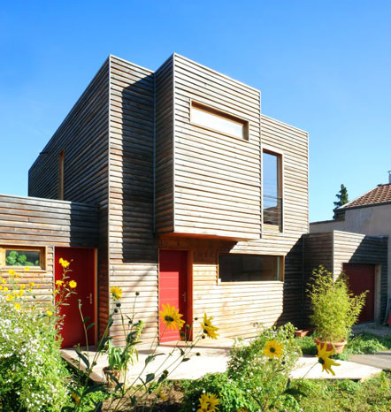 Wood frame house with cubic shapes